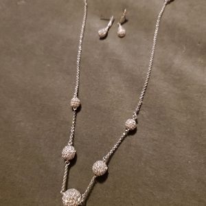 Silver and diamond necklace with matching earrings
